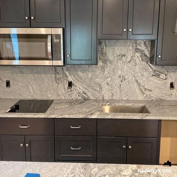 silver cloud granite with white cabinets