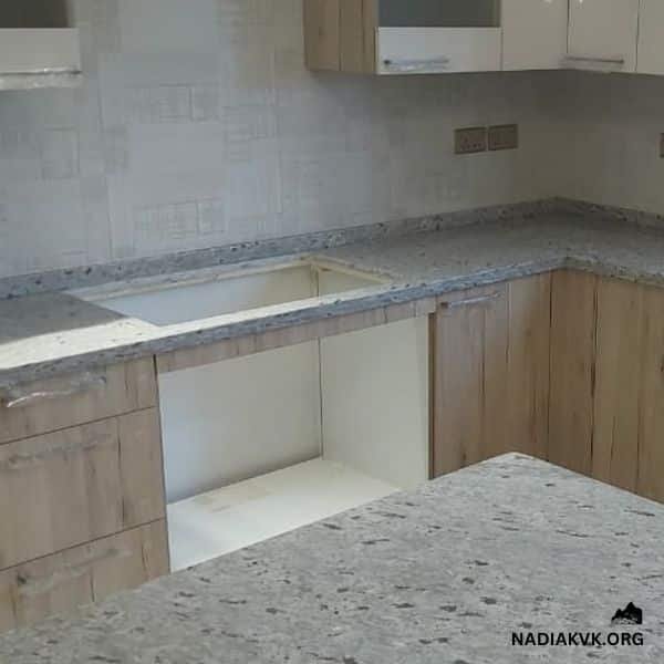 moon white granite with white cabinets